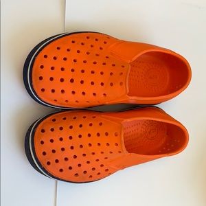 Orange and blue native shoes